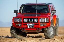 ARB 4x4 Accessories - ARB 3468010 Front Deluxe Bull Bar Winch Bumper Hummer H3 2006-2009 with Flares